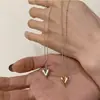 Collar con colgante de corazón geométrico vintage desgastado, cadena corta para clavícula de estilo minimalista hip-hop para mujer, joyería transfronteriza europea y americana