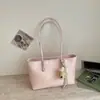 Bolso tote de gran capacidad con patrón tejido minimalista para el trabajo y los desplazamientos, nuevo bolso de hombro grande versátil de moda 2026