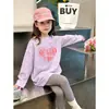 Camiseta de manga comprida para meninas 2026 primavera e outono nova estilosa camiseta básica de primavera infantil para crianças mais velhas, top de algodão puro com desenho