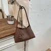 Bolso de mano tejido de alta gama transfronterizo, nuevo popular versátil para madre e hija de principios de otoño 2026, bolso de hombro