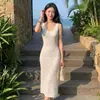 2026 Elegante Socialité Estilo Hong Kong Retro Seda de Hielo Encaje Hueco Vestido de Tirantes Dulce Picante Femenino Largo