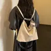 Bolso tote texturizado vintage de alta gama para mujer, nuevo modelo 2026, bolso de hombro casual simple, mochila versátil y elegante