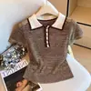 Fábrica de Tejidos Dalang Estilo Old Money Calado Cuello Polo de Punto Hombro Normal Manga Corta Camiseta para Mujer Verano 2026 Ropa Exterior