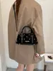 Bolso tote de ante de lunares de alta gama, nicho, para mujer, nueva colección otoño 2026, bolso de mano exquisito y versátil, bolso tipo almohada