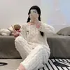 Fábrica fuente pijama nuevo de manga larga de forro polar coral para mujer otoño e invierno franela gruesa invierno conjunto para estar en casa
