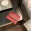 Cartera de Monedas de Diseño Único para Mujer 2025 Nuevo Estilo de Moda Bolso de Mano Versátil Bolso Pequeño Cartera Corta Simple Casual
