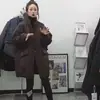 Jaqueta de Algodão de Comprimento Médio Workwear para Mulheres Outono e Inverno 2025 Novo Estilo Europeu Gola Alta Solta Estilo Corta-Vento Jaqueta de Algodão