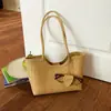 Bolsa Tote de Verão de Alta Qualidade com Padrão Trançado para Mulheres 2026 Nova Bolsa de Ombro de Grande Capacidade Versátil para Trabalho e Lazer
