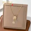 Colar de borla de diamante com esmalte de gota de luxo leve estilo francês microincrustado para mulheres, corrente de clavícula doce de dopamina da moda de alta qualidade