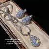 Aretes de gema gota de agua azul Maria brillantes chapados en oro de 18K parra tesoro colorido circón gota de agua clip para oreja