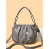 Bolsa Feminina 2025 Nova Moda Estilo Coreano Bolsa Concha para Mães de Meia-Idade, Bolsa de Mão Versátil, Bolsa de Ombro Simples, Bolsa Transversal