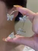 Super Flash simples de una pieza mariposa borla larga colgantes para oreja sin perforar clip para oreja aretes temperamento personalidad modernos nuevos aretes