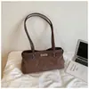 Bolsa tote de camurça transfronteiriça para mulheres, novo modelo 2026, versátil para o trabalho, grande capacidade, toque de alta qualidade, bolsa de mão, bolsa de ombro, bolsa de axila