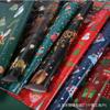 Fabricantes en stock al por mayor papel de regalo navideño nuevo caja de regalo navideña papel de regalo impresión a color a una cara papel de regalo para ramos
