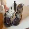 Diseño de nicho estilo vintage 2026 otoño e invierno nueva moda botas vaqueras para mujer con lazo de lona de tubo corto botas de montar