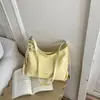 Bolso pequeño súper popular para mujer, nuevo bolso de hombro de moda y elegante primavera-verano 2026, bolso cruzado tipo cubo versátil