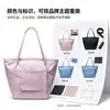 Bolsa de lona para viaje más vendida para mamás, bolso de mano coreano de nicho para mujer de gran capacidad, nuevo para el verano