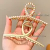 Pinzas para el cabello de alta gama para mujer para la parte posterior de la cabeza, exquisitas pinzas de garra de perla para el día a día, elegantes pinzas de tiburón para salir, venta al por mayor de artículos pequeños de Yiwu