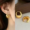 Textura cepillada mate Estilo de lujo ligero Artístico Retro Dorado Geométrico Sensación de alta gama Pendientes de la Fábrica de Joyería Yiwu