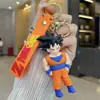 Pingente de chaveiro Dragon Ball Ornamento de borracha macia em PVC Figura de anime de desenho animado Chaveiro Pingente de bolsa para casal