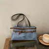 Hebilla de cinturón moderna retro en stock otoño 2026 nueva moda diseño simple bolso de un solo hombro bolso de axila para mujer