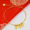 Tobillera de Moda Color Arena Dorada Vietnamita Latón Chapado en Oro 24K Campana Doble Capa Giratoria y Transportadora de Cuentas Tobillera para Mujer Exportación Moneda Europea Dorada