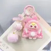 Llaveros y colgantes para bolsos de dibujos animados lindos con flocado 3D para niños de tres años, pequeños accesorios de moda de transmisiones en vivo