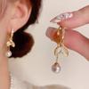 Brincos de cauda de peixe de pérola de luxo leve e luxuoso Temperamento feminino Tassel Design Sense Ear Buckle All-match Atmospheric Distinctive Trendy Earrings
