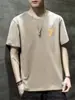 Estilo Coreano 2024 Verano Nuevo Camiseta de Manga Corta para Hombre Estudiante Top de Moda Media Manga Holgada Media Manga