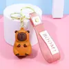 Chaveiro Fofo de Capivara Desenho Animado Porquinho da Índia Aquático Boneca Pingente Pequeno Chaveiro de Casal Pingente para Mochila Escolar Venda por Atacado