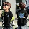 Camiseta Base Elegante de Dos Piezas Falsas para Niños con Mangas Largas Otoño 2026 Nuevo Estilo Coreano Dibujos Animados Ropa Interior para Bebé Niño Camiseta