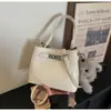 Bolsa Transfronteiriça Primavera 2026 Nova Versátil Casual de Alto Padrão Nicho Retrô Bolsa de Ombro Feminina Bolsa de Mão Bolsa de Balde