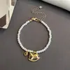 Pulsera Colgante Zodiaco Year Pony Perla con Circonita Tejida Cadena Clavícula Lujo Ligero Nicho Conjunto de Joyería de Moda Elegante