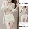 Traje de baño de cuatro piezas Hada coreana Nuevo traje de baño blanco Bikini para mujer Vacaciones Aguas termales Orilla del mar Versión de manga larga Verano No
