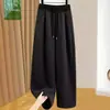 Atacado transfronteiriço de calças casuais de cor sólida com cordão e bolsos, nova coleção de outono para mulheres, com cintura elástica simples e design solto de perna larga