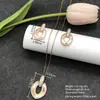Conjunto de pendientes y collar Xuping estilo vintage de nicho europeo y americano transfronterizo, conjunto de joyería elegante de aleación de cobre, venta al por mayor y hecho a medida