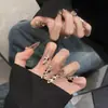 Uñas Portátiles de Alta Gama para Año Nuevo: Rojo Retro Cisne Puntos, Ojo de Gato Francés, Moño, Brillo Deslumbrante, Manicura Hecha a Mano que Realza el Cutis