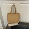 Nueva bolsa de mano grande para commuters transfronterizos para mujer, bolso de hombro casual de cuero suave, bolso simple estilo coreano para mamá