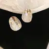Brincos Ovais Flor de Gota d'Água Minimalistas Agulha de Prata, Brincos Modernos e Únicos com Design de Nicho Versáteis e Estilosos
