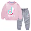 Conjunto de Roupas Infantis Novo para Primavera e Outono de 2026 para Tiktok: Conjunto de Duas Peças de Moletom e Calça Comprida Infantil, Roupa de Algodão Puro com Manga Longa