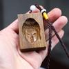 Sándalo verde 3D listado tallado cóncavo colgante de cabeza de Buda tridimensional nada texto de tarjeta colgante de juego pieza de mano de sándalo venta al por mayor