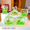 Muñeca de Gato Kt de Dibujos Animados con Arena Líquida en una Botella Venta al por Mayor Decoración Creativa para Escritorio Llavero Acrílico Colgante Pequeño Accesorio