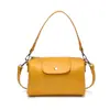 Bolso Cilíndrico de Moda de Alta Calidad para Mujer 2026 Nuevo Modelo con Correa de Hombro Ajustable Bolso Almohada Moderno Simple Casual Bolso Cruzado