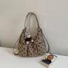 Mochila Casual de Lunares para Mujer 2026 Nueva Bolsa de Hombro para Viajes Diarios Bolso Cubo Versátil de un Solo Hombro Bolso Cruzado de Moda