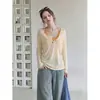 Cárdigan fino y holgado de color amarillo cremoso con botones y cuello en V para mujer, protección solar, top holgado y casual de manga larga para otoño-verano 2026
