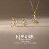 Aretes Collar Set Estrella de Cuatro Puntas Cobre Perla Brillante No se Desvanecen para Mujer Lujo Ligero Gama Alta Joyería al por Mayor Transfronteriza