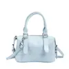 Bolso de mano casual simple estilo coreano para mujer 2026 nueva moda para ir al trabajo color liso almohada bandolera