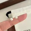 Pendientes lisos de plata con temperamento de alta gama para mujer 2024 nuevos populares moda pendientes de aro pequeños pendientes pendientes de temperamento
