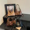 Bolso tipo dumpling de cuero suave con patrón de lichi para mujer, nuevo bolso tote vintage otoño e invierno 2026, bolso cruzado de gran capacidad para el día a día