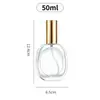 Botella de perfume redonda plana transparente en stock, botella de spray de vidrio portátil, material de embalaje cosmético, botella de recarga de aceite esencial de perfume con logotipo